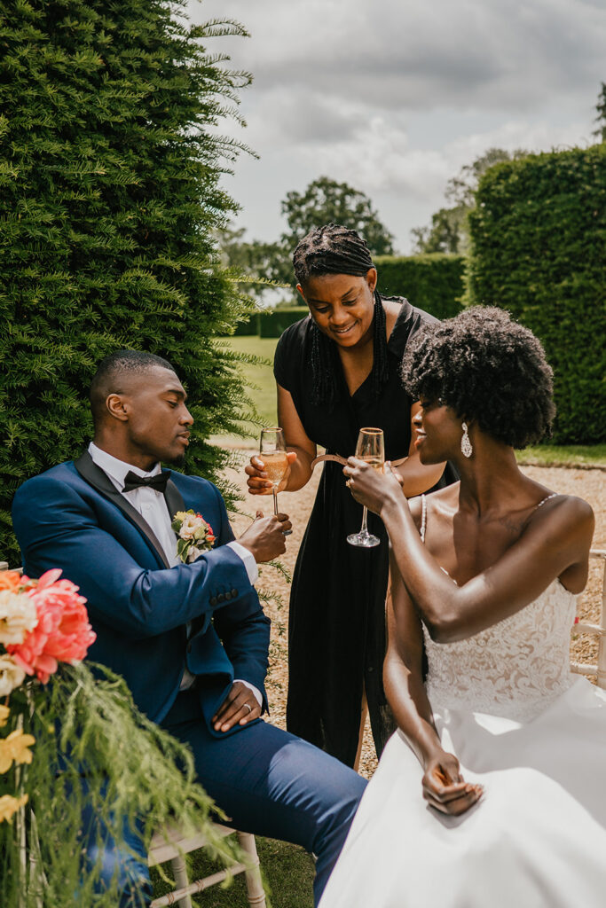 Couple cheersing Natasha the wedding planner - Best Ways for a Christian Couple to Start Planning Their Wedding