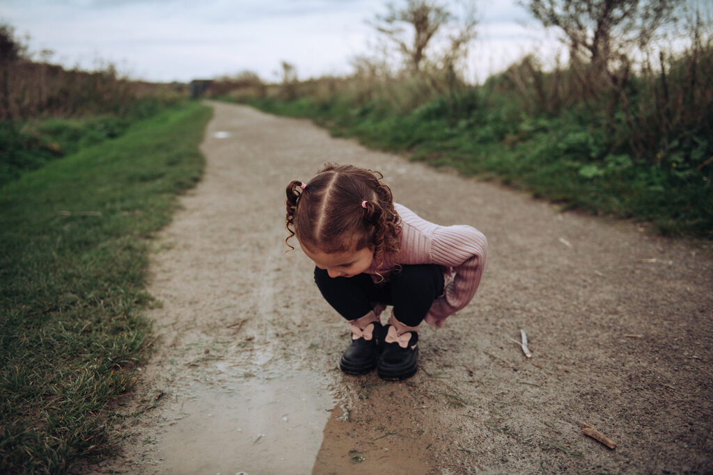 Daughter on family photo shoot at Pegwell Bay in Thanet during winter