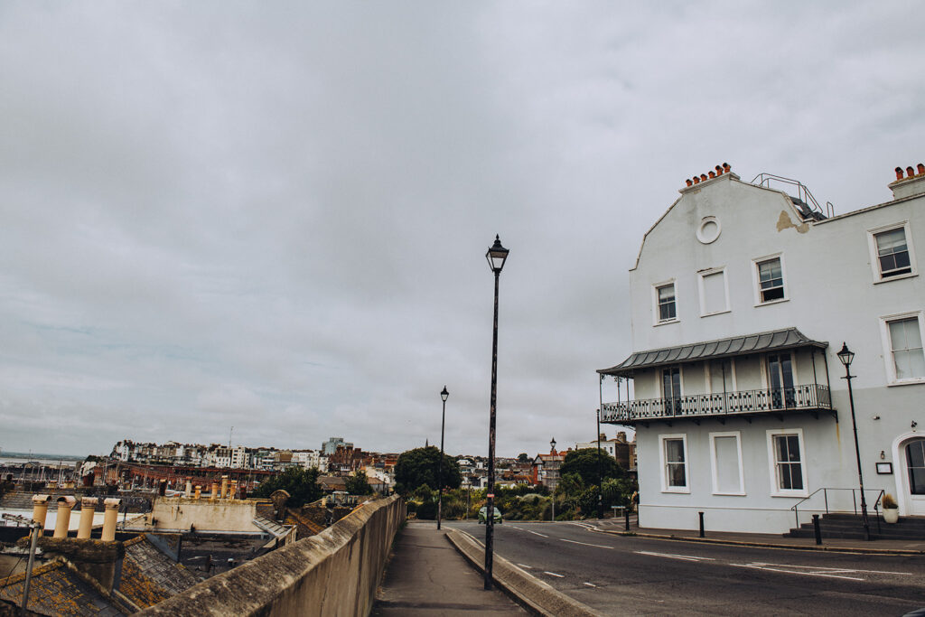 Exterior of Albion House in Ramsgate and the road winding down the hill
