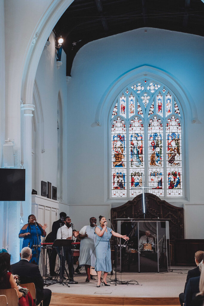 Gospel choir at a wedding at Holy Trinity Church in Cambridge