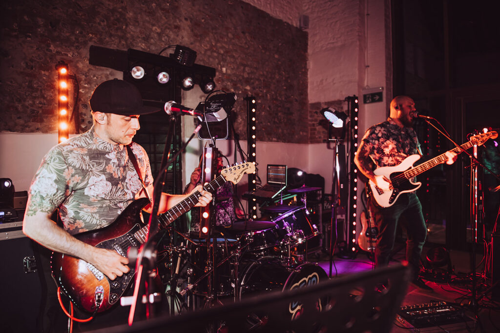 Band playing at a wedding at Curds Hall Barns in Norfolk