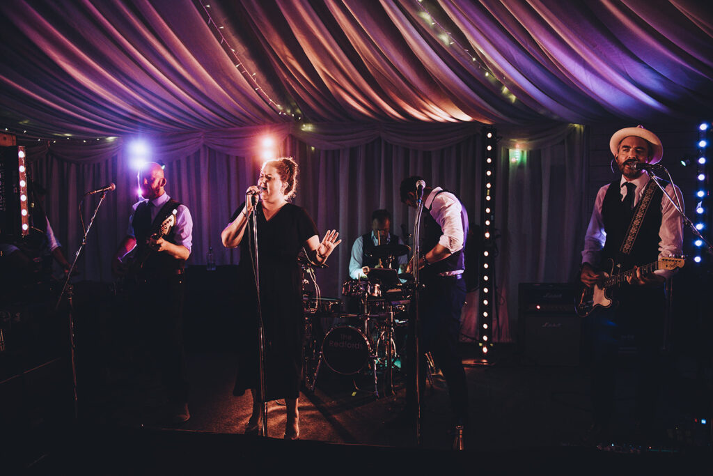 The Redfords Band playing at a wedding at Reach Court Farm