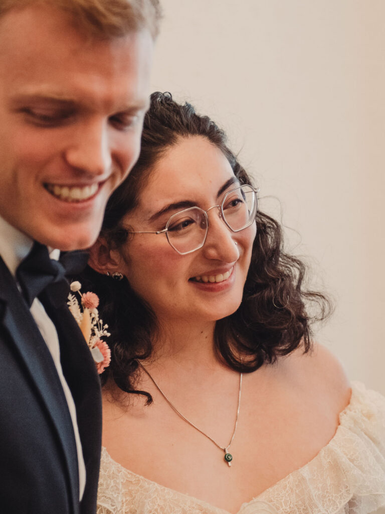 Bride and groom smiling