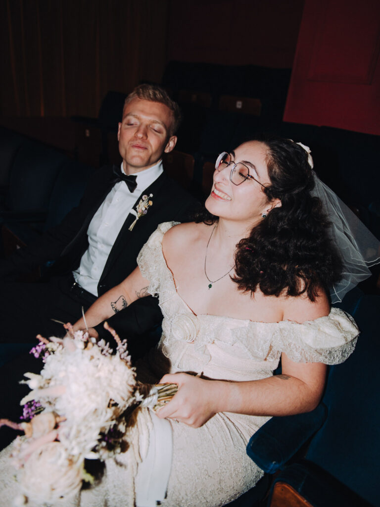 Bride and groom sat in chairs in the Palace Cinema in Broadstairs