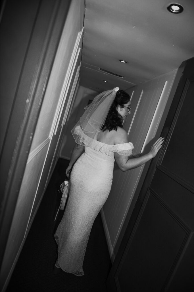 Bride standing by door in the Palace Cinema in Broadstairs