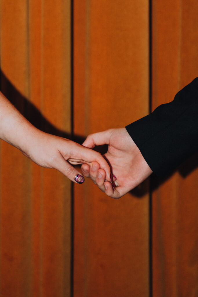 Bride and groom standing together in the Palace Cinema in Broadstairs