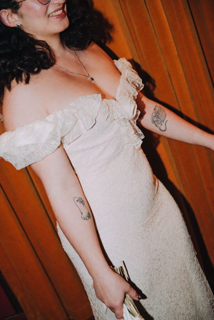 Bride and groom standing together in the Palace Cinema in Broadstairs