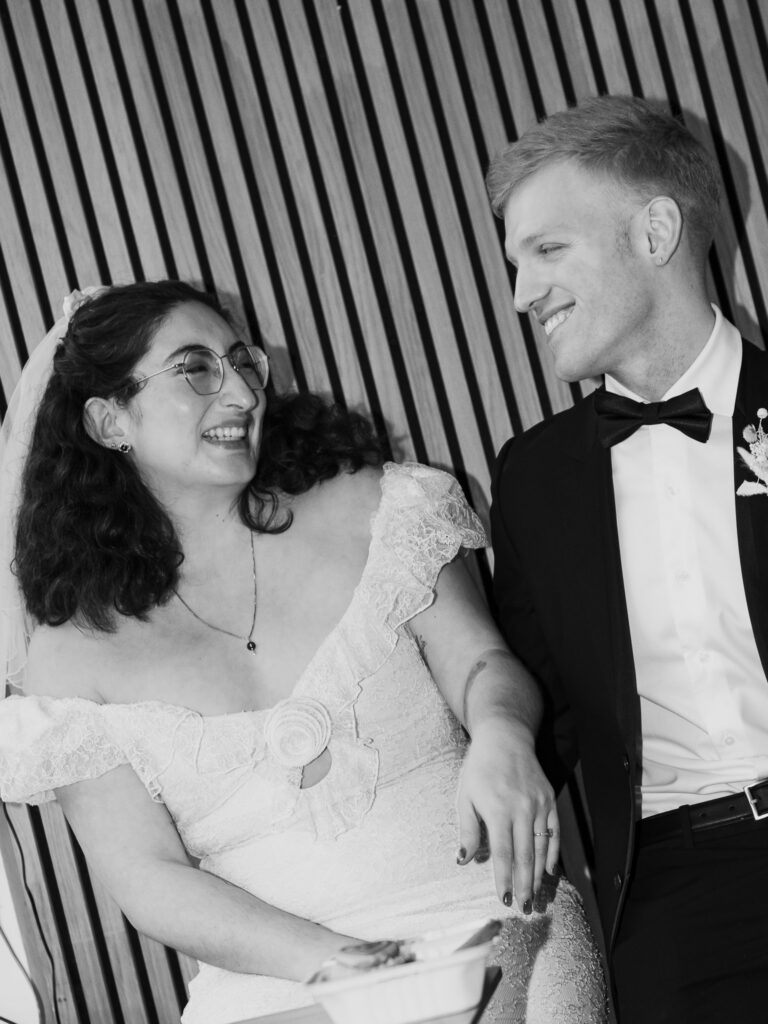 Bride and groom sat in a chair in Giant Coffee in Broadstairs