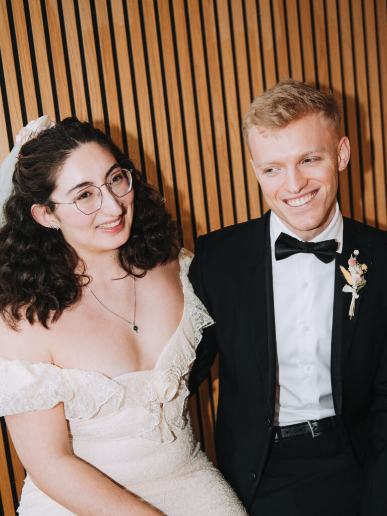 Bride and groom sat in a chair in Giant Coffee in Broadstairs