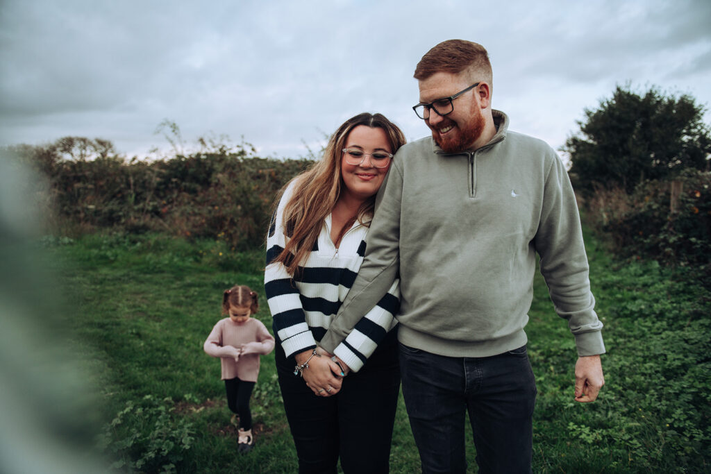 Young family walking in Pegwell Bay