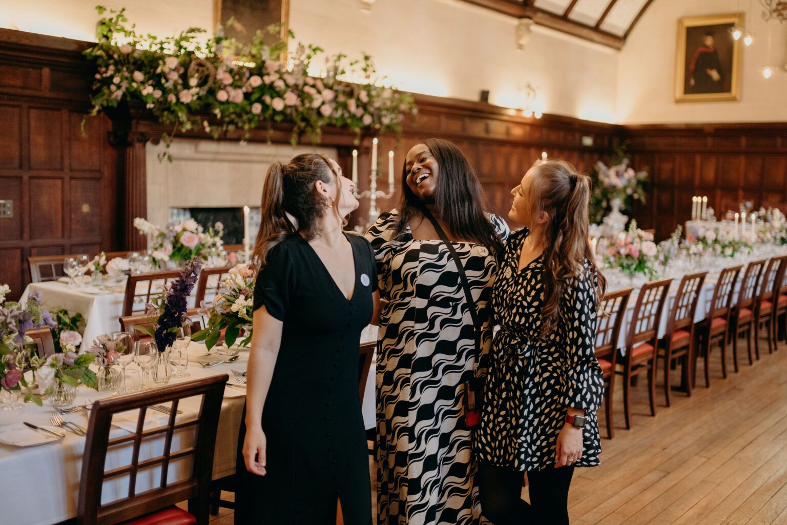 Sommy laughing with fellow wedding planners