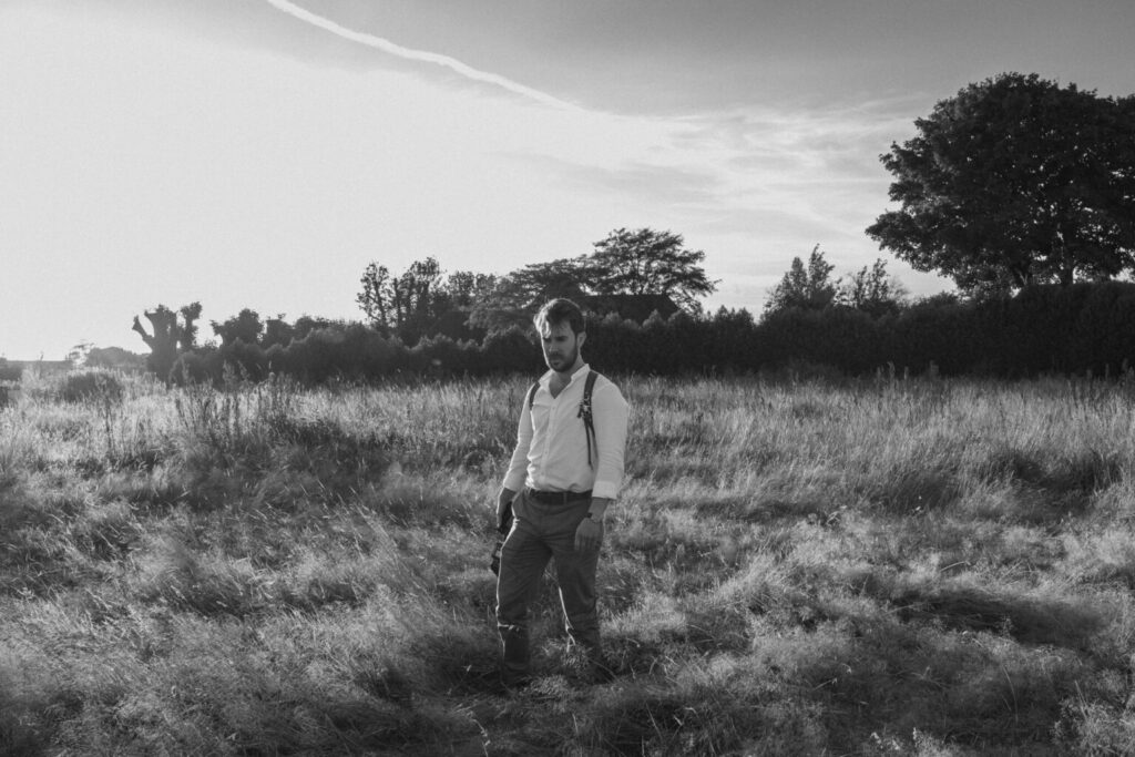 Confidence tips for new photographers by Tom Keenan in a field