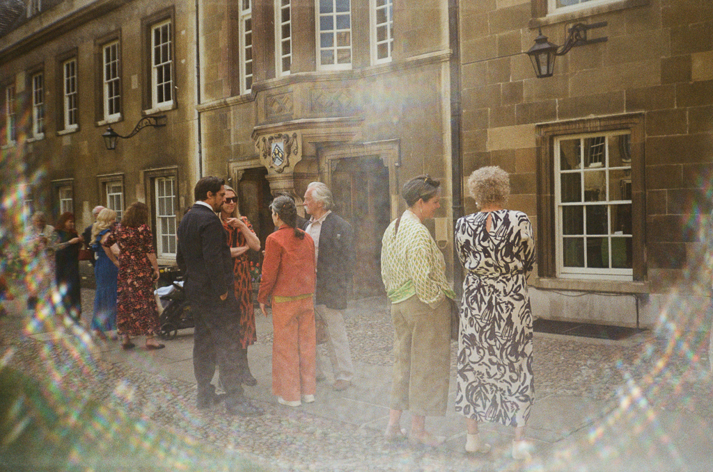 Analogue film scan of a wedding reception in gonville & caius college