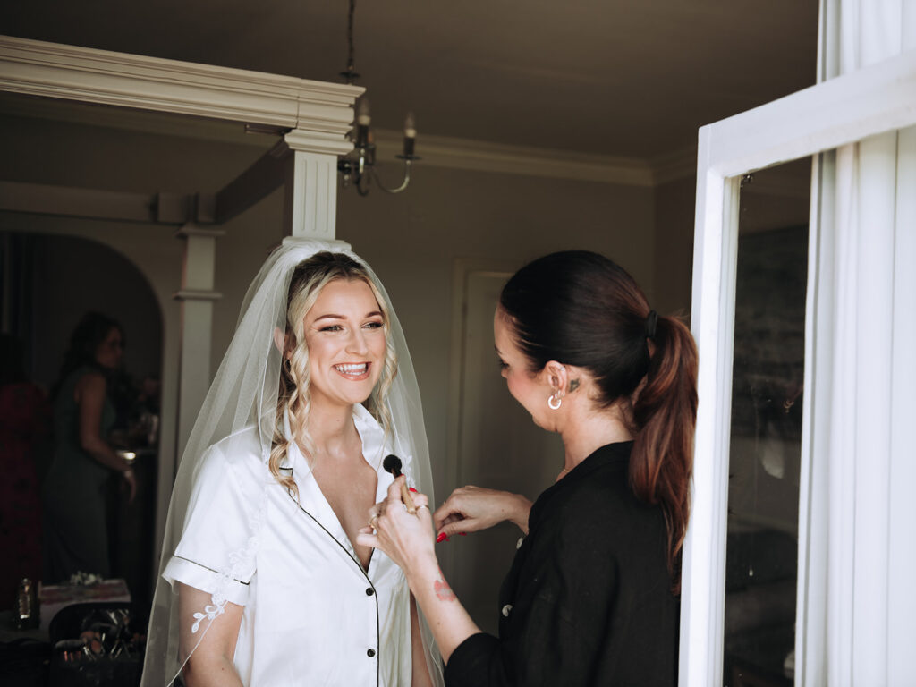 bride having her make up done