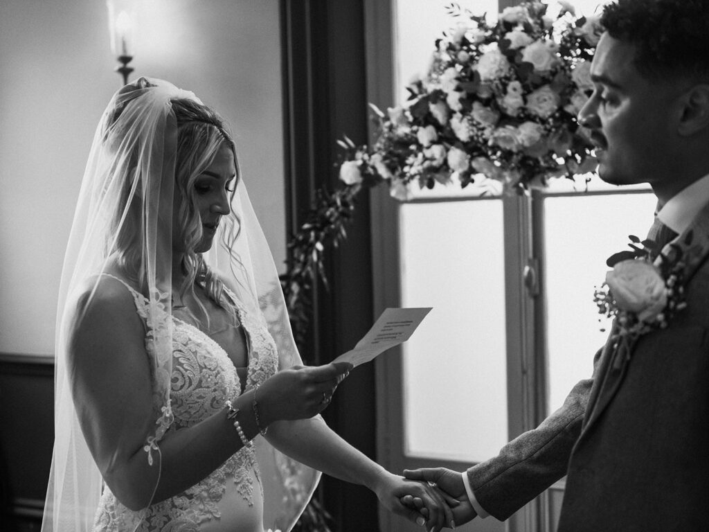 Bride reading wedding vows