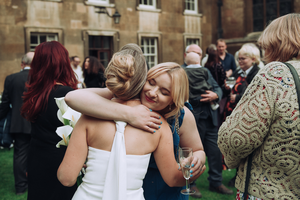 Bride hugging a guest