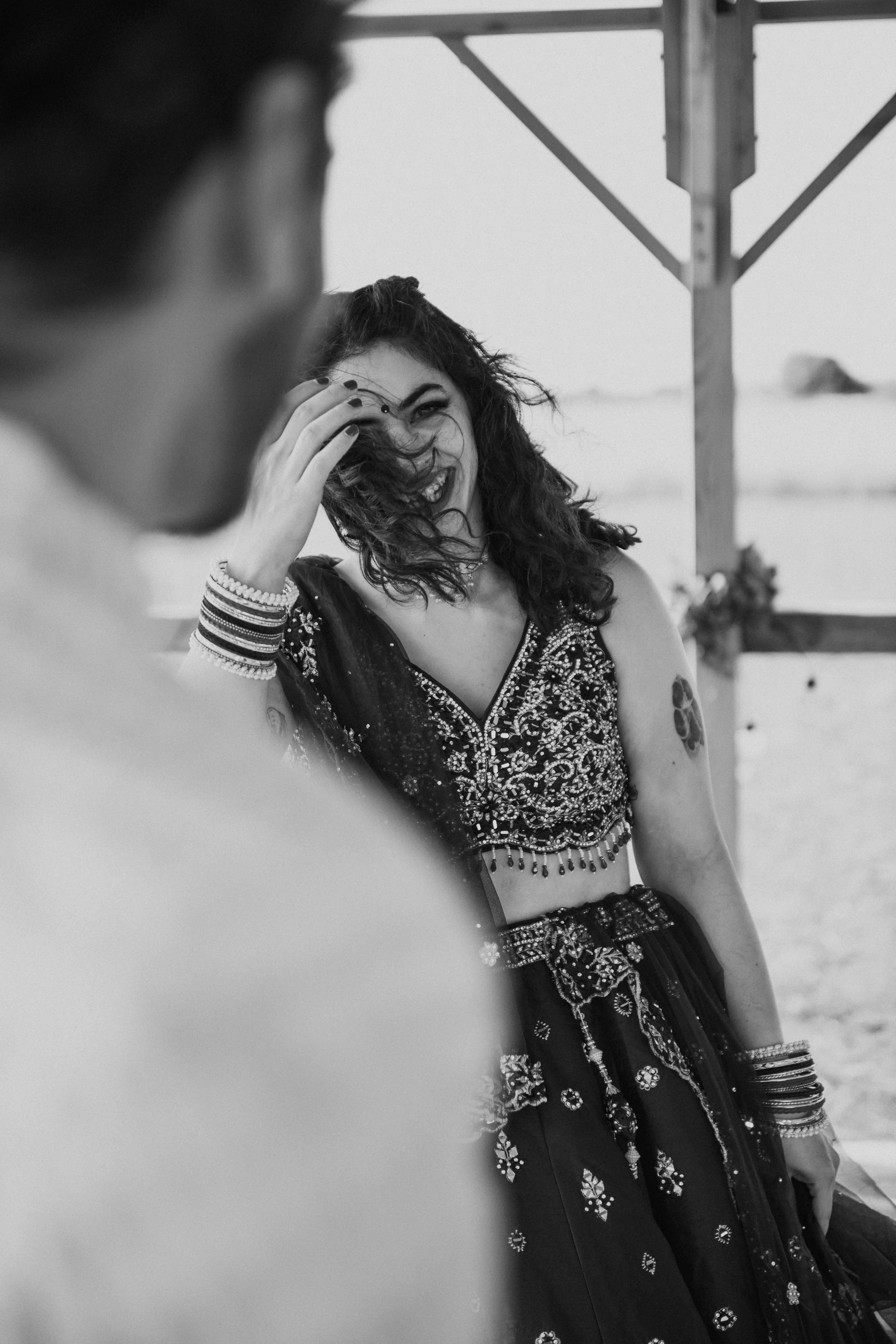 Bride laughing during vows