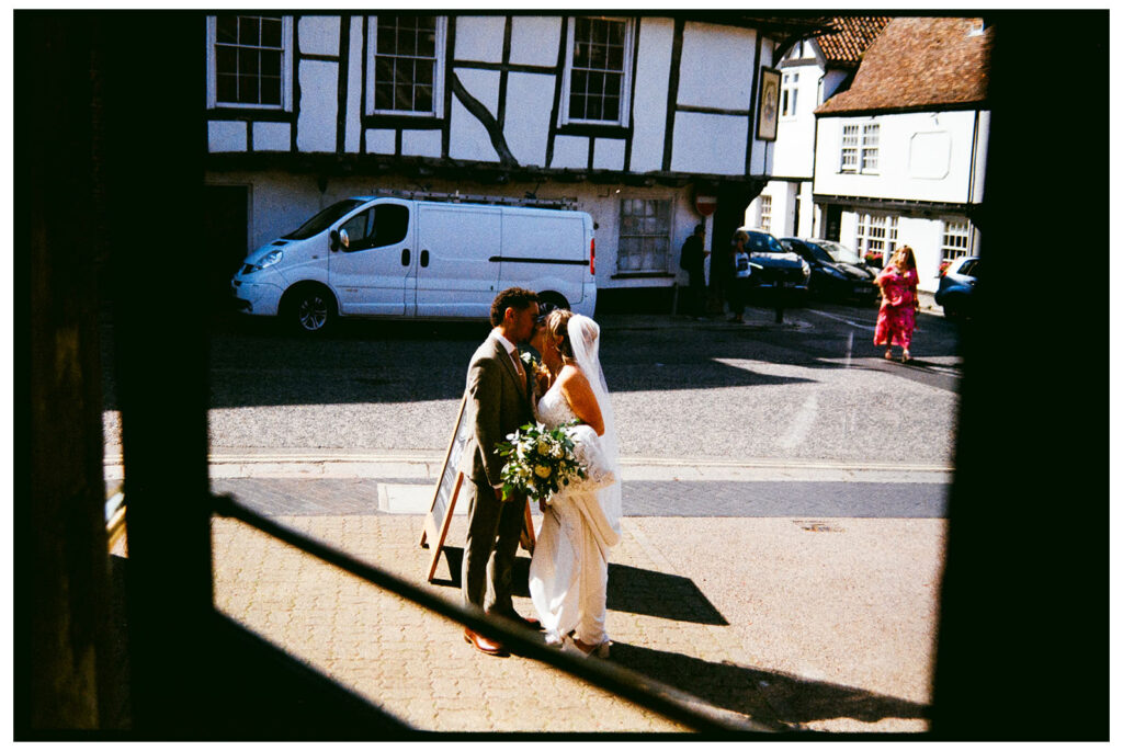 Newlyweds kissing caught on film