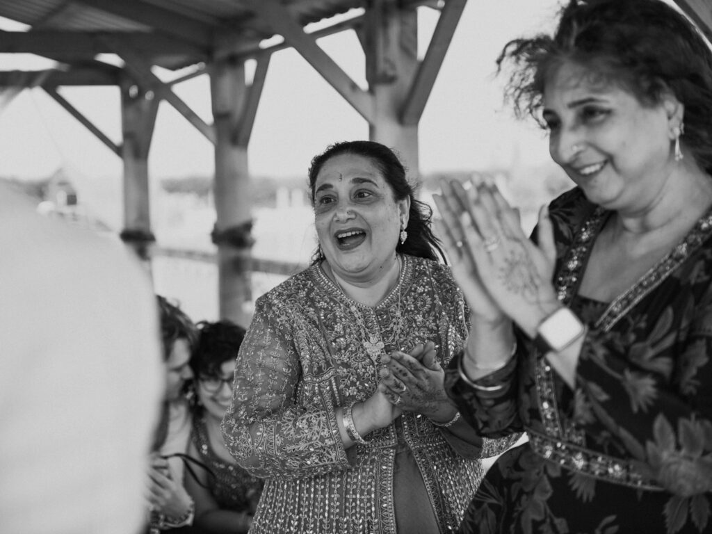 Grandmothers laughing at wedding