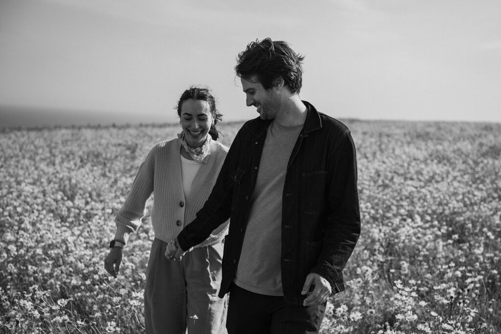 Engaged couple of a field in Kent