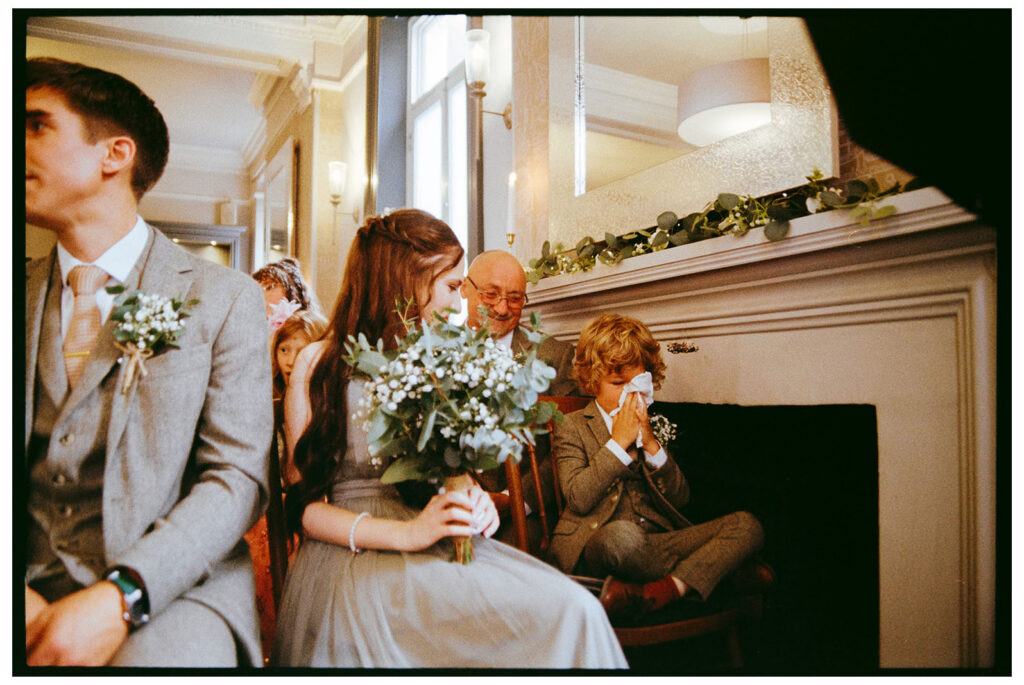 Analogue film scan of emotional children at wedding