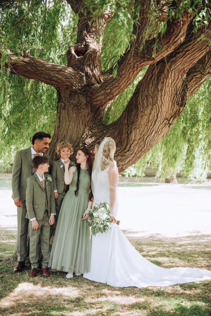 Fine art family portrait under a tree in Sandwich