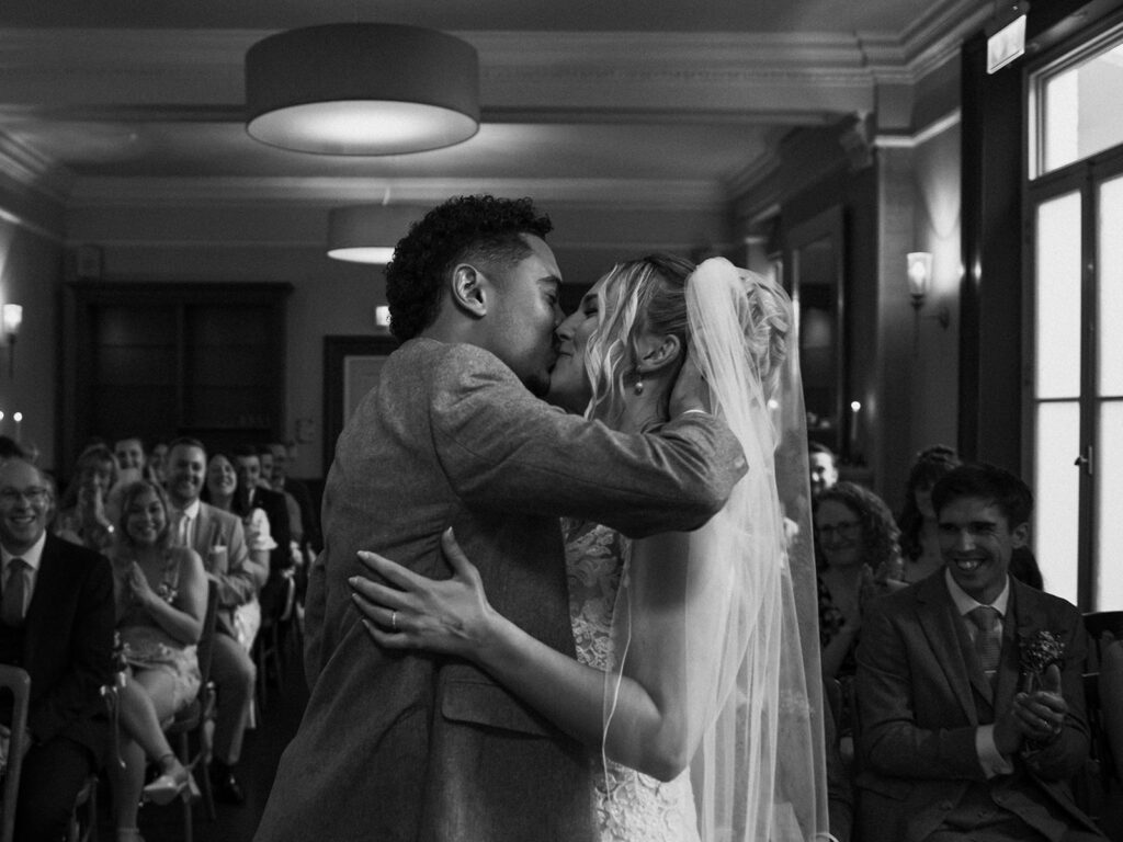 first kiss at wedding at the bell hotel