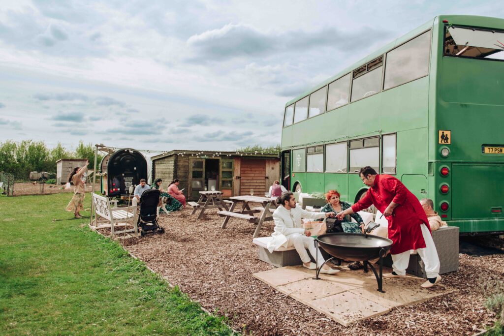Wedding guests eating at Hempsall Farm
