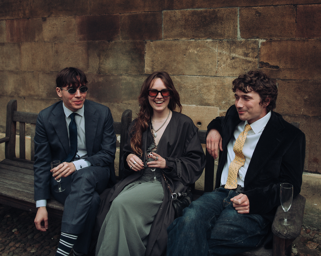 Gen Z wedding guests chatting