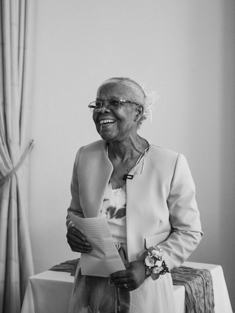 Grandmother giving speech at wedding