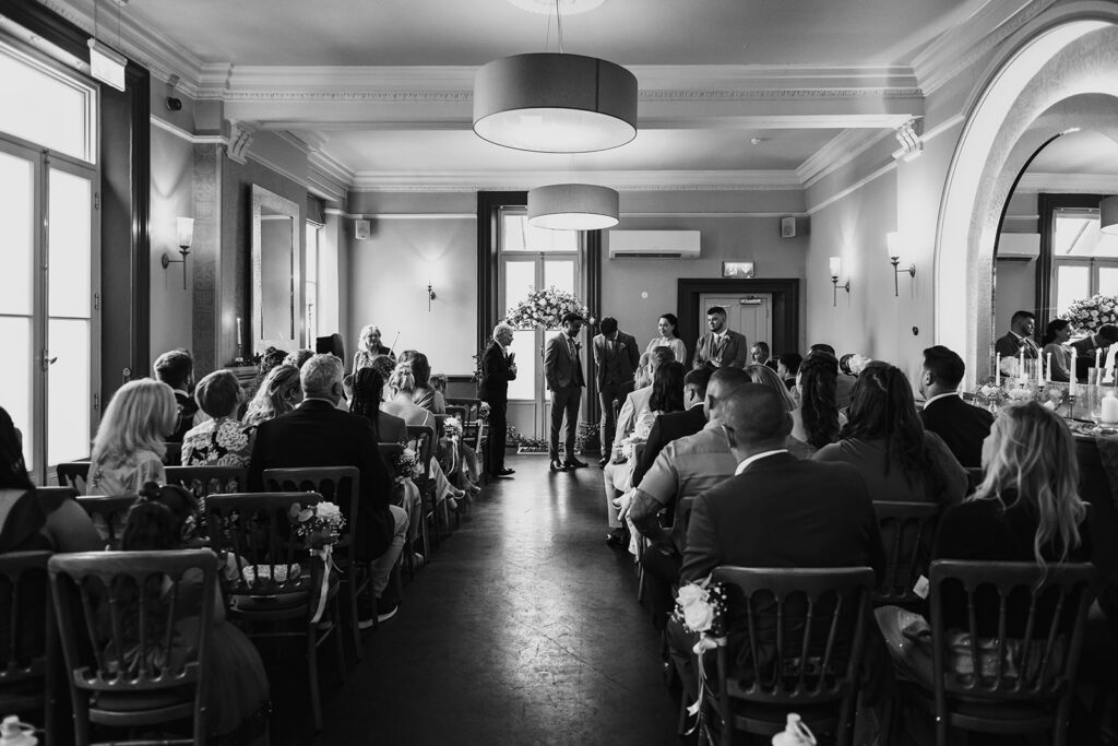 Groom and best man waiting for bride to arrive