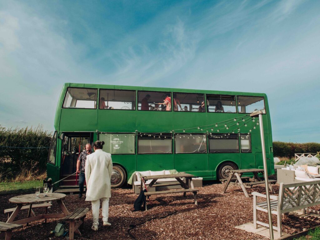 Wedding guests on bus at Hempsall Farm