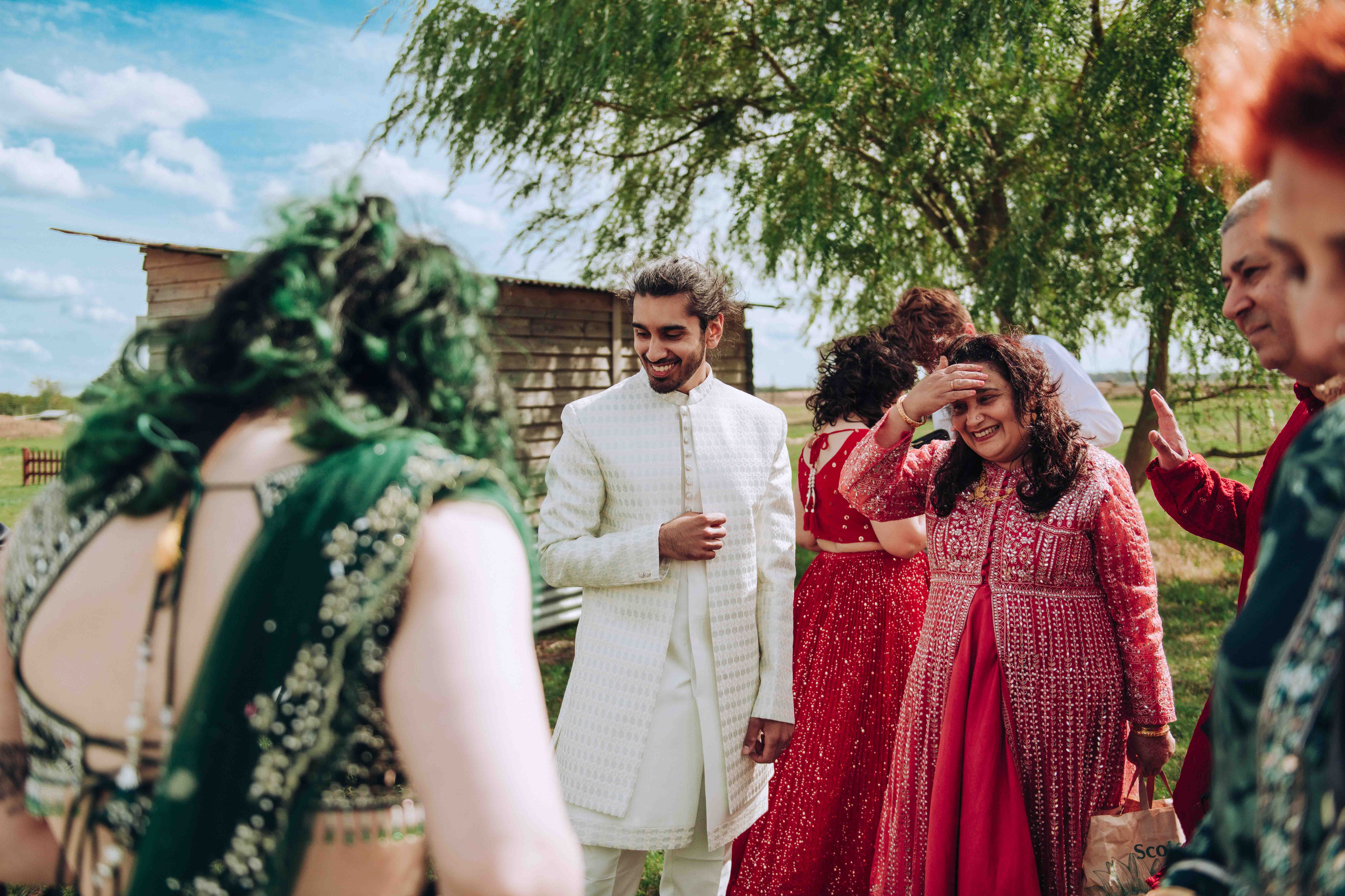 Groom smiling at dog