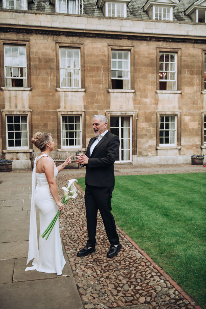 Bride and groom greeting each other