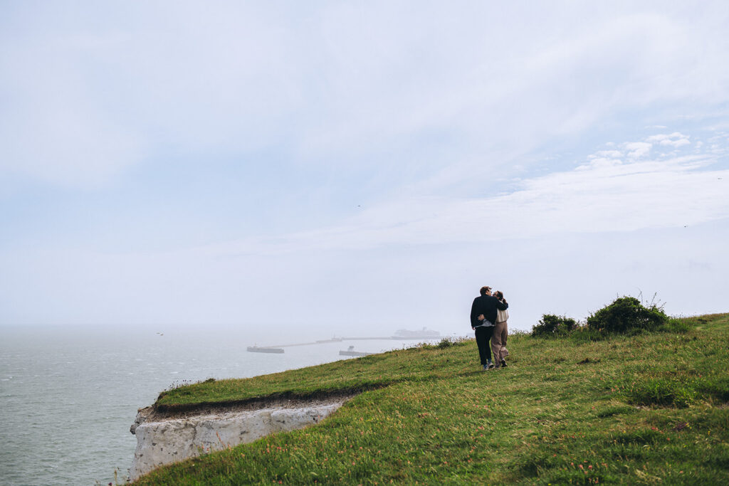 Couple walking by the port of Dover