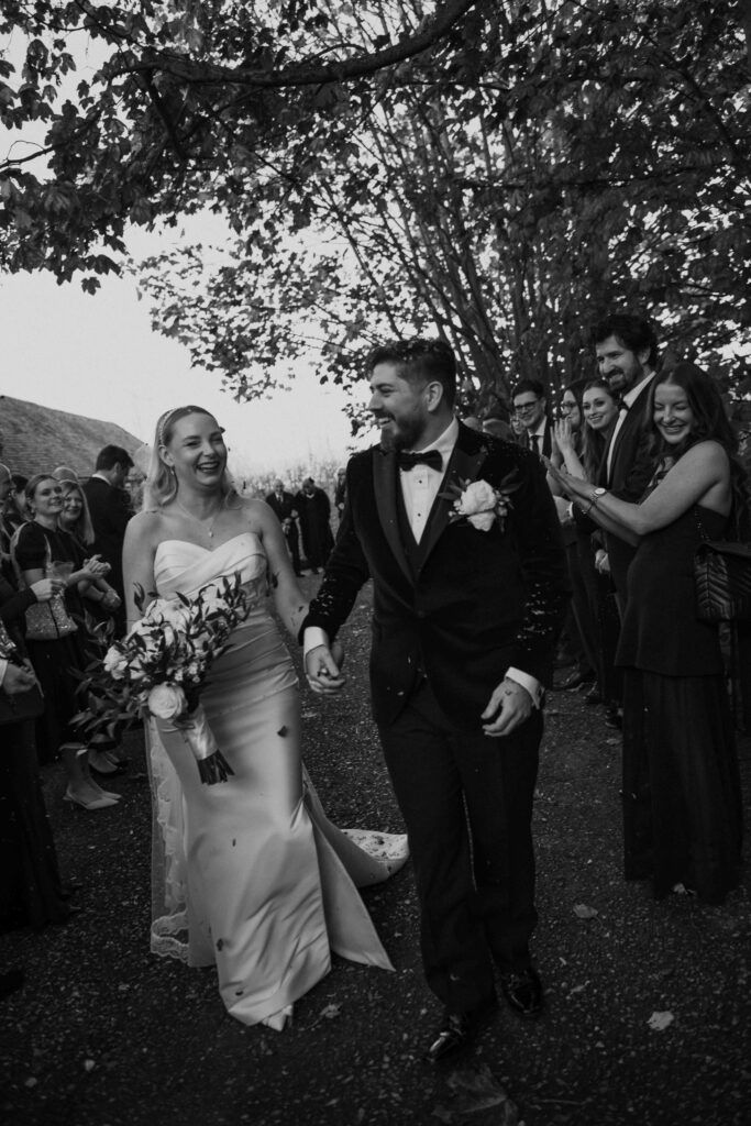 Confetti shot of bride and groom