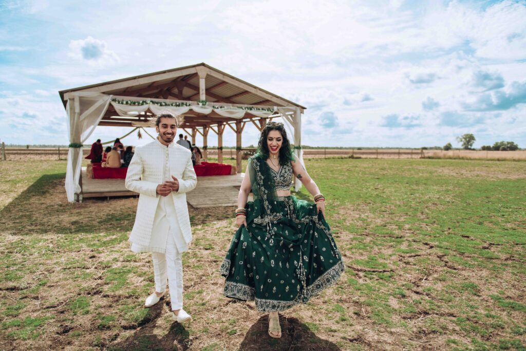 Bride and groom walking at their luxury micro wedding