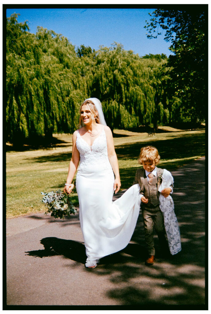 Analogue film scan of mother and son in wedding dress