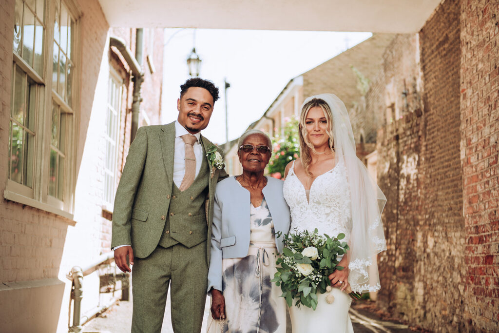 Bride and groom with grandmother