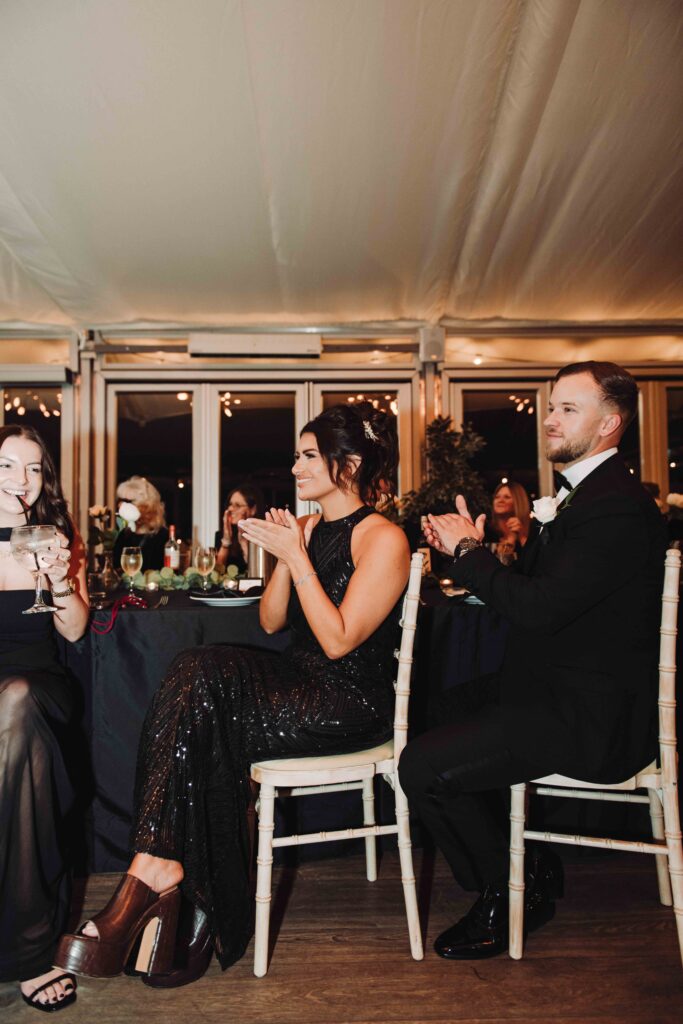 wedding guests clapping