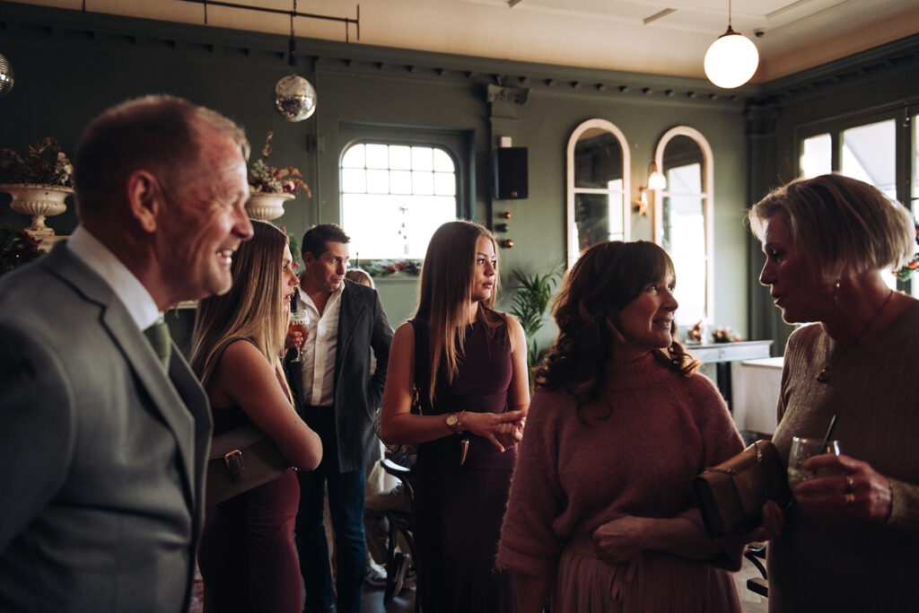 Wedding guests chatting at a wedding