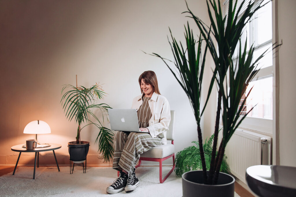 Brand photography shot of hypnotherapist on a laptop