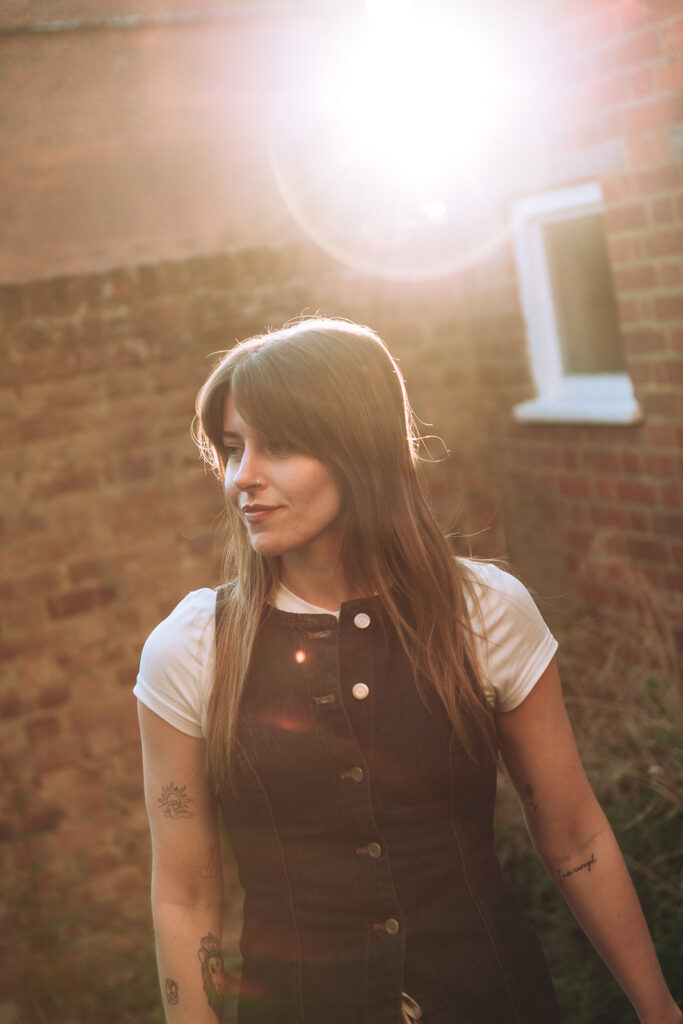Portrait of therapist with sun behind her
