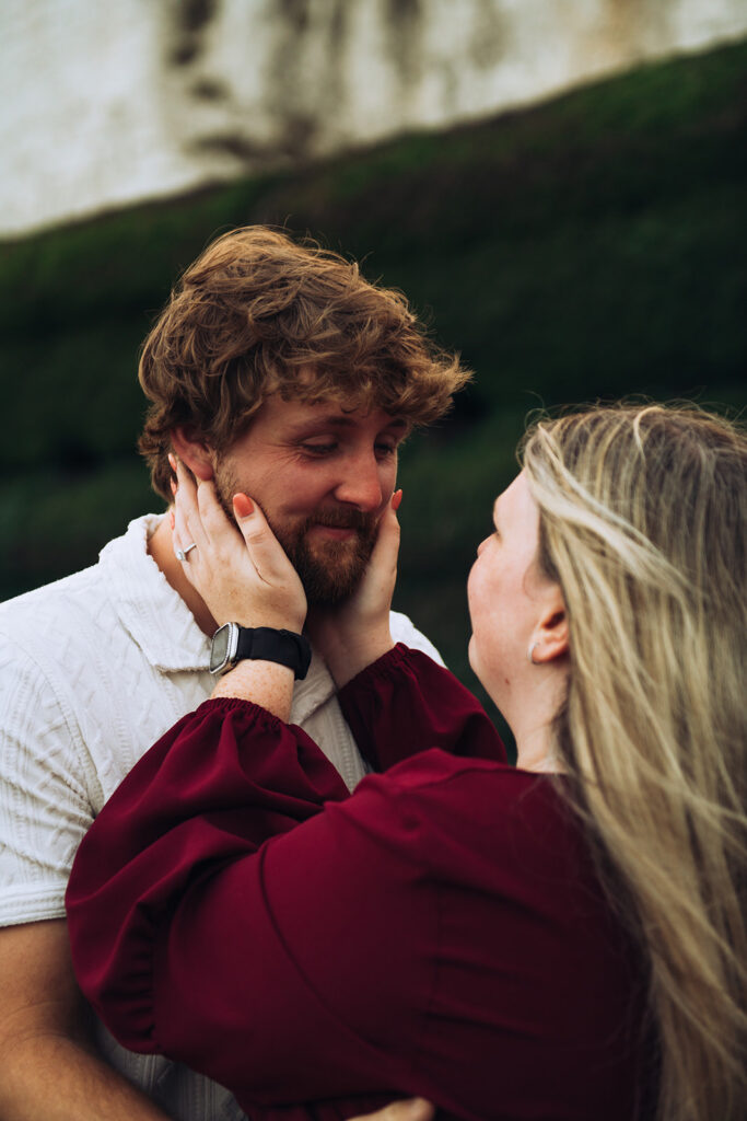 Woman cuddling man
