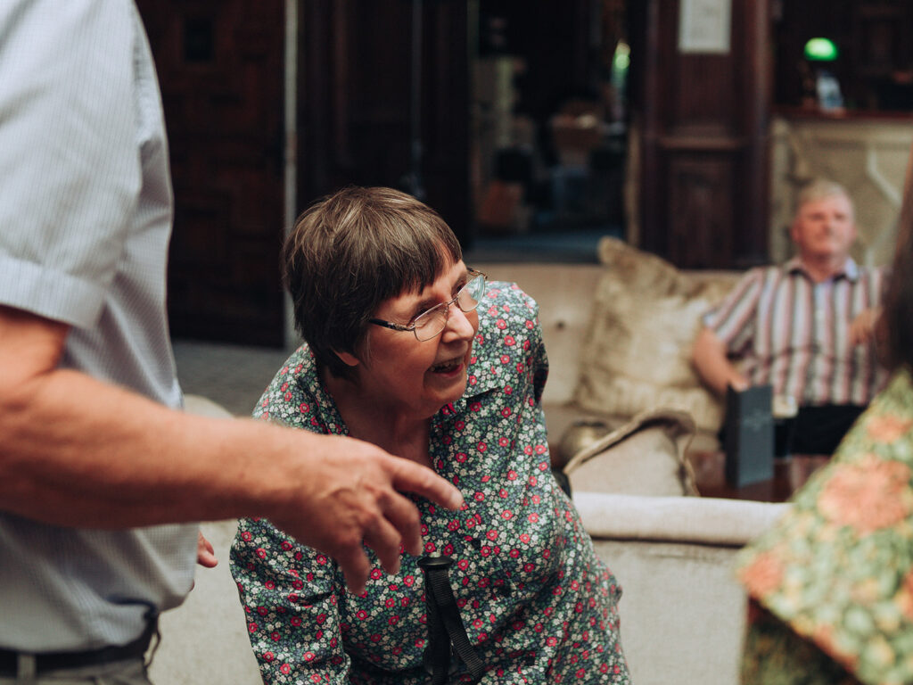 Elderly lady chatting with friends