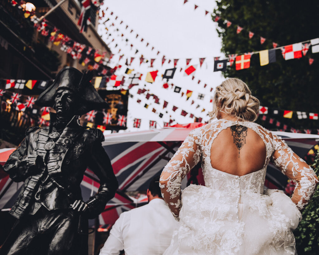 Newlywed couple at Trafalgar Tavern in London celebrating