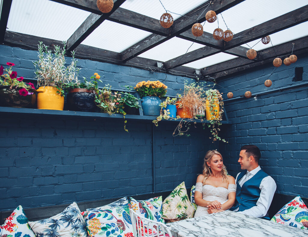 Wedding couple enjoying drinks in the Rose in Deal Kent