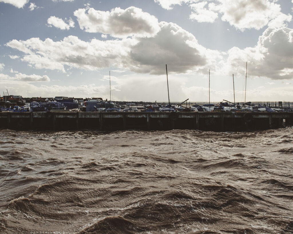 Windy weather and choppy seas at East Quay in Whitstable